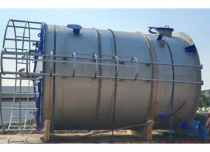 A chemical storage tank is being transported