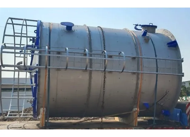 A chemical storage tank is being transported
