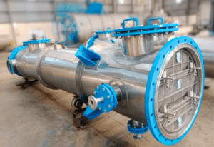 Distillation column with flanged nozzles and stainless steel shell designed for chemical processing applications