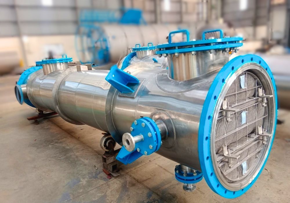 Distillation column with flanged nozzles and stainless steel shell designed for chemical processing applications