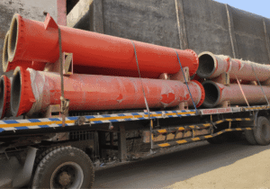 Industrial distillation column have been loaded into flatbed trucks for transport