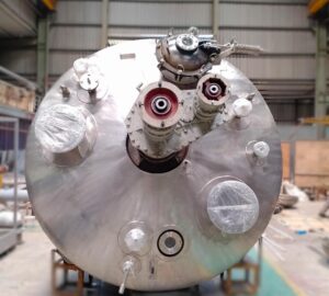 Stainless steel nauta mixer vacuum dryer with agitator drive, manhole and process nozzles in workshop