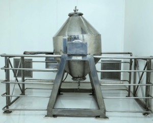 Industrial-grade double cone blender machine for uniform blending of dry powders and granules.