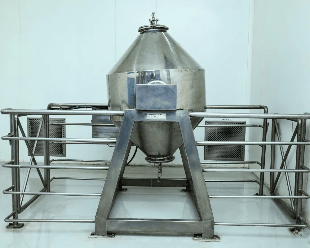 Industrial-grade double cone blender machine for uniform blending of dry powders and granules.