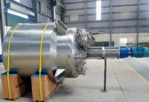 Industrial cryogenic reactor vessel with cooling jacket, designed for API manufacturing and cryogenic chemical processes